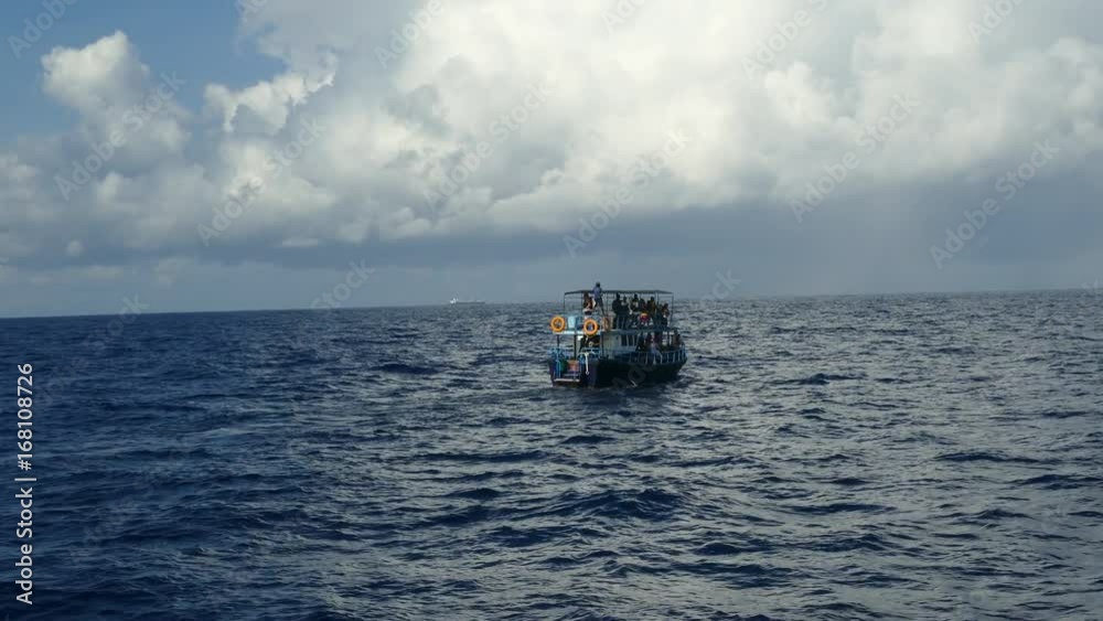 Whale watching boat at sea in Sri Lanka