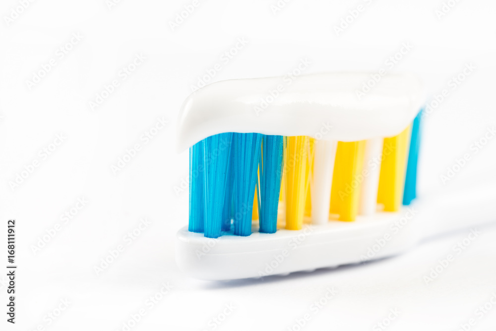 Closeup macro toothbrush isolated over white background with copy space Closeup macro toothbrush isolated over white background with copy space