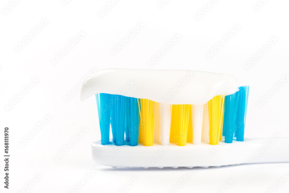 Closeup macro toothbrush isolated over white background with copy space Closeup macro toothbrush isolated over white background with copy space