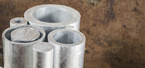 Metal pipelines profile on rusty background