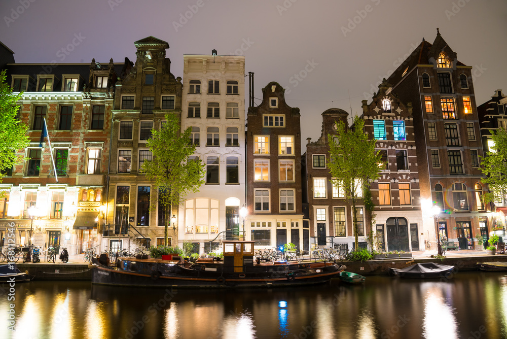 Canals of Amsterdam at night. Amsterdam is the capital of the Netherlands