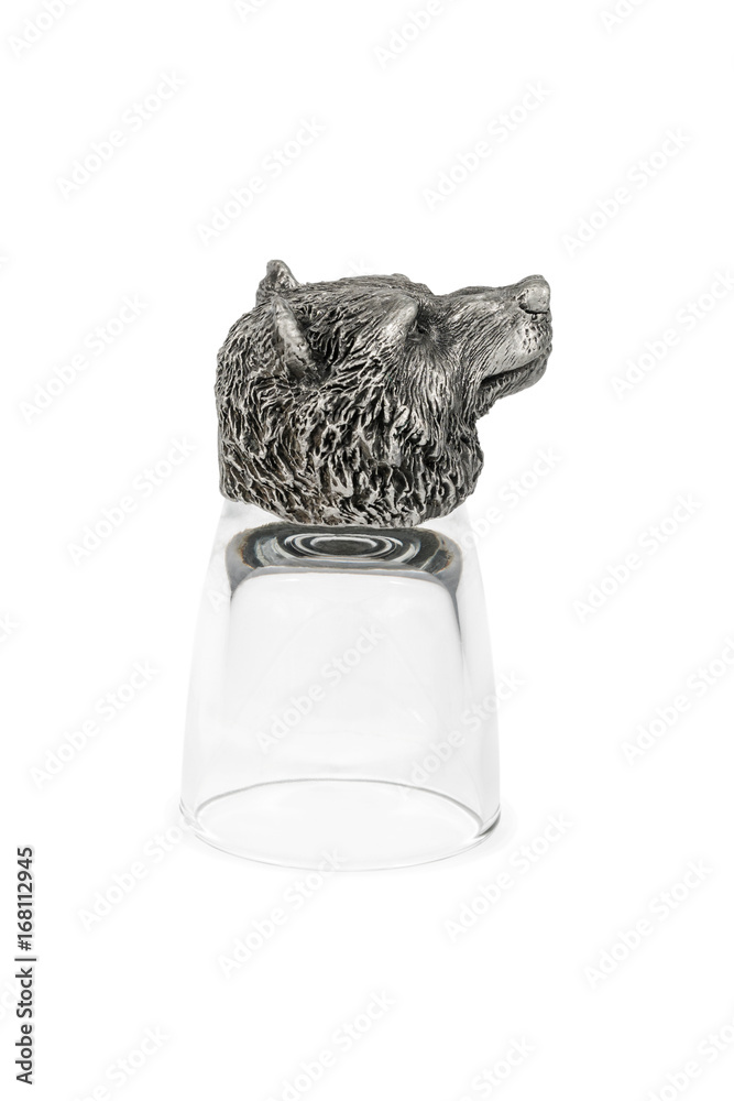 Obraz premium Decorative glasses for vodka with a bottom in the form of a bear head, inverted, isolated on a white background