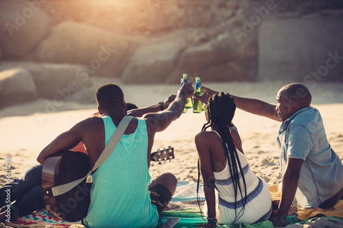 Photography Group of friends having beach party