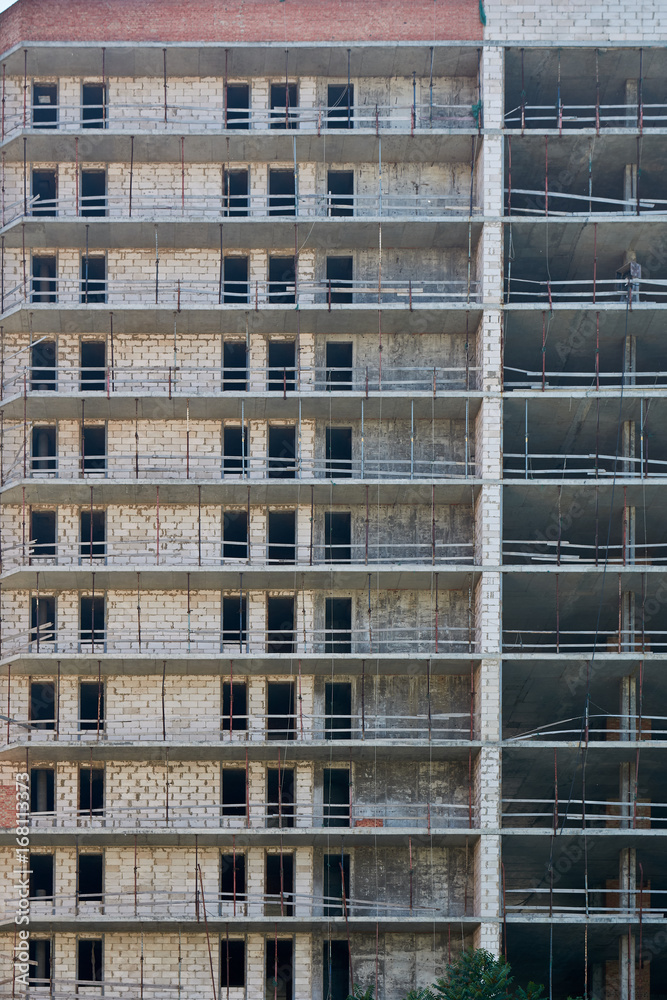 Multi-storey building under construction without walls.