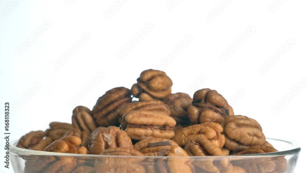 The nut pecan rotates on the turntable. The nut pecan rotates on the turntable.