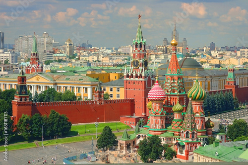 View on Moscow Red Square, Kremlin towers, Clock Kuranti, Saint Basil's Cathedral church, Lenin mausoleum. Panorama Hotel Russia. Moscow holidays vacation tours famous sightseeing. Moscow Red Square