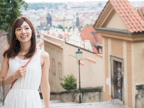portrait of young asian woman traveling in europe