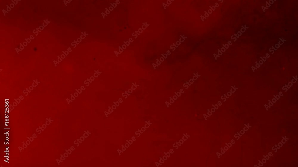 Dark red powder in liquid with bubbles. Abstract background. Dark red powder in liquid with bubbles. Abstract background.