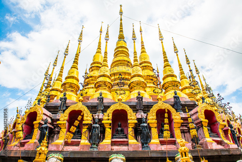 Ancient pagodas in Phra That Suthon Mongkhon Khiri temple photo