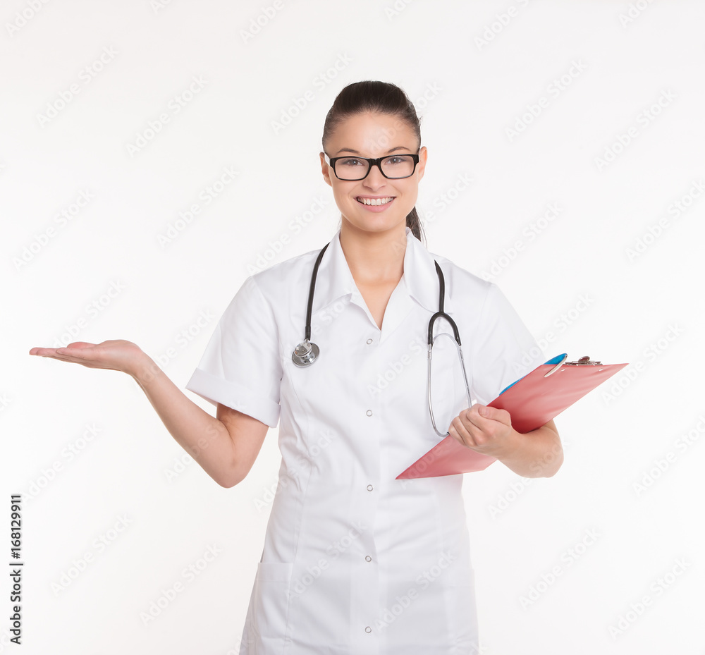 Portrait of a beautiful young woman doctor with stethoscope and clipboard. Portrait of a beautiful young woman doctor with stethoscope and clipboard.