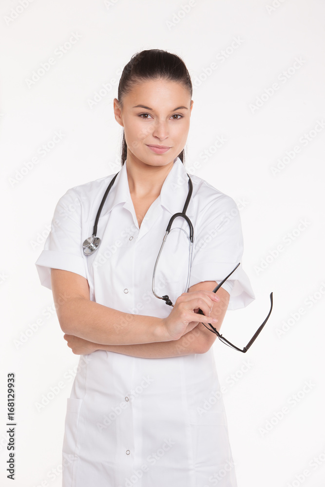 Fototapeta premium Portrait of a beautiful young woman doctor with stethoscope.