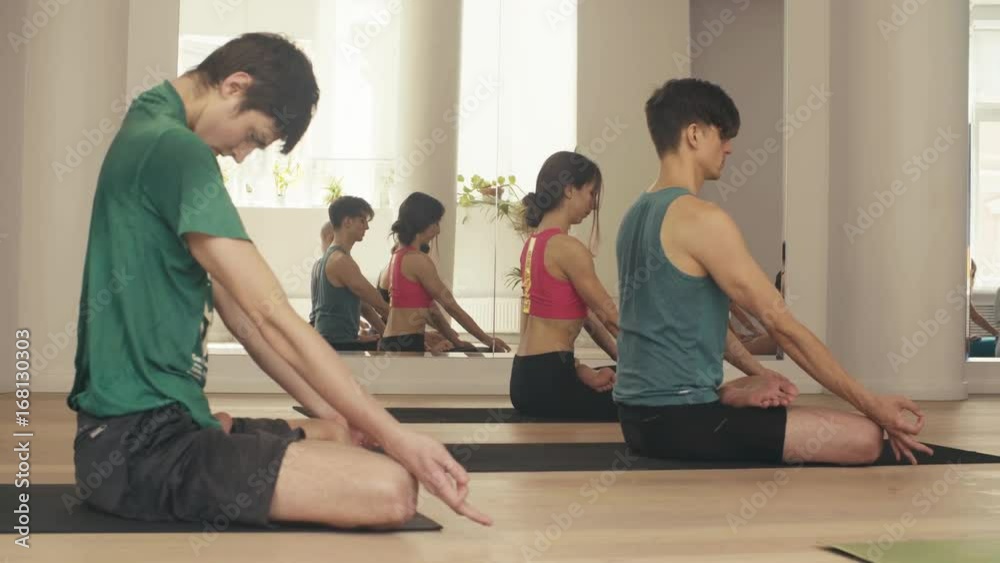Several people studying yoga in the studio Several people studying yoga in the studio