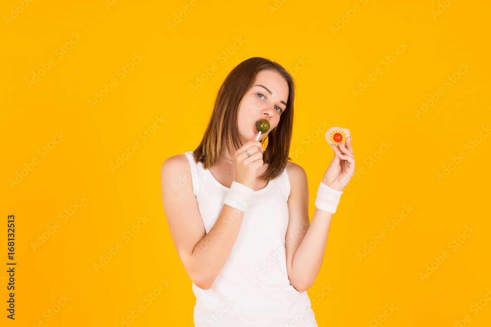 Young pretty girl with lollipop, happy and cute Young pretty girl with lollipop, happy and cute