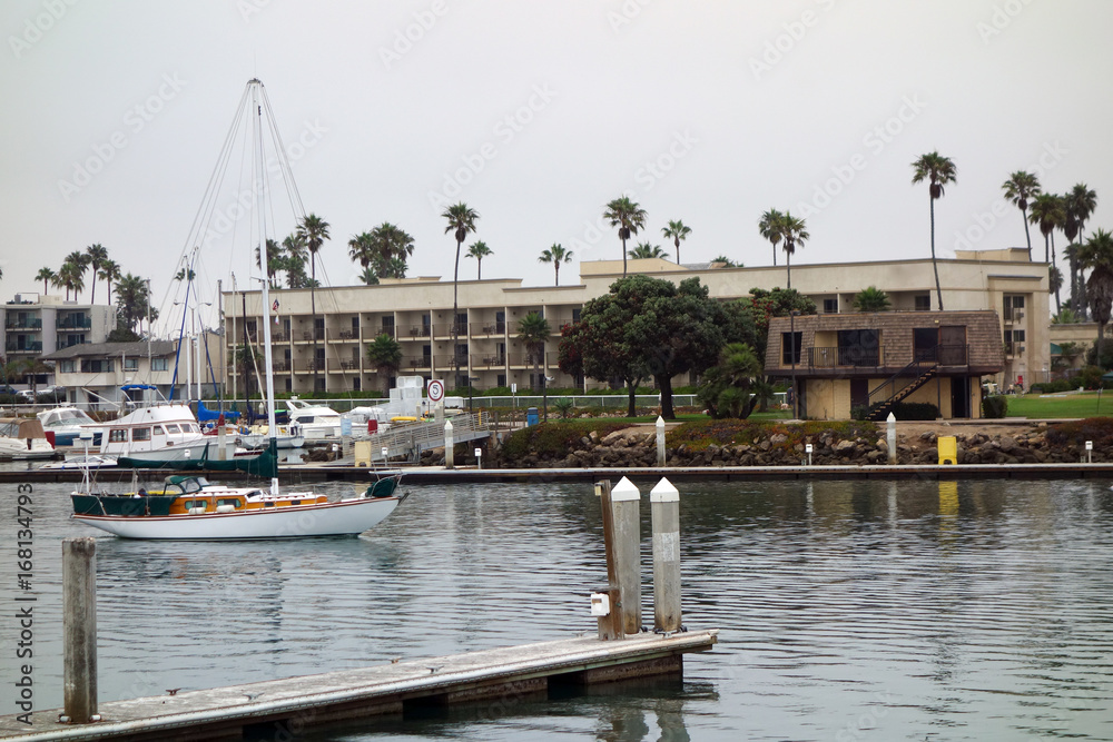 Recreational and fishing boats at the dock in Oxnard marina, Ventura county, Southern California Pacific coast; copy space