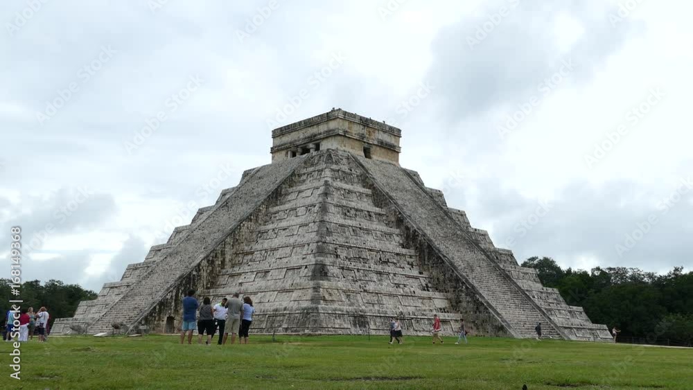 Tourists in front of Chichen Itza Mayan ruin in Yucatan Mexico Tourists in front of Chichen Itza Mayan ruin in Yucatan Mexico
