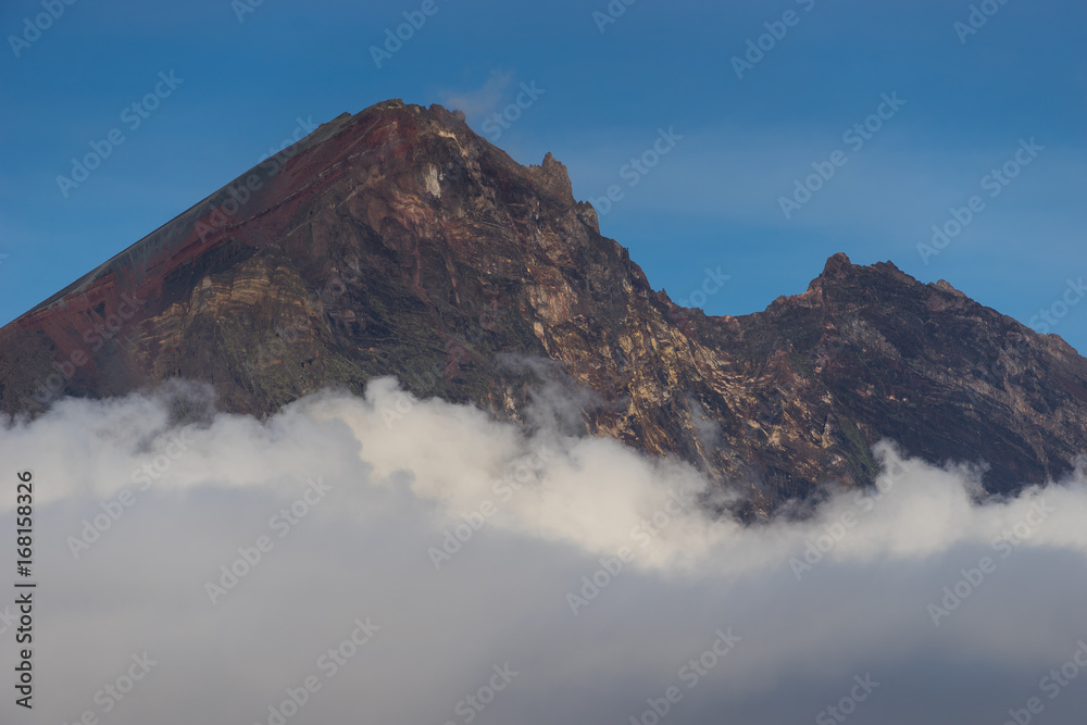 Rinjani volcano mountain peak above the cloud, Lombok island, Indonesia