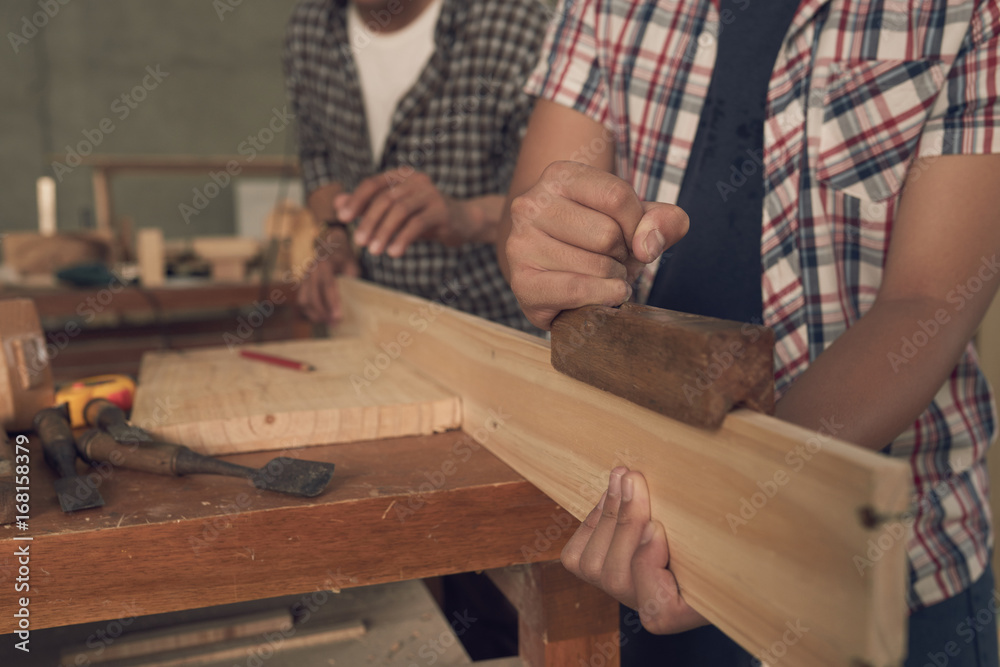 Working with wooden plank
