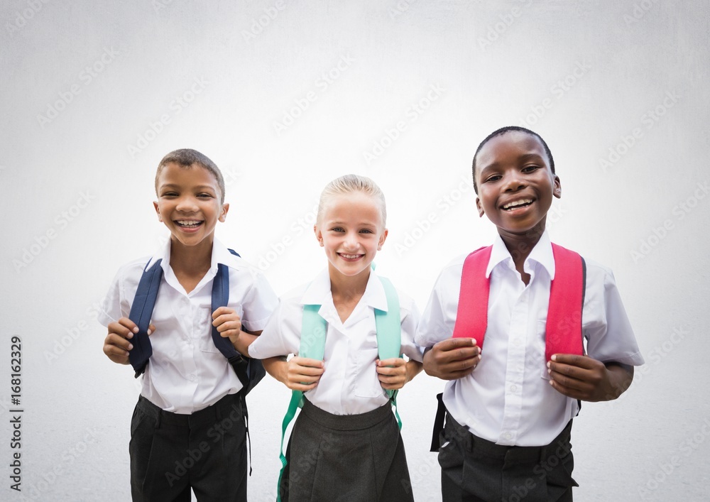 School kids in front of grey background School kids in front of grey background