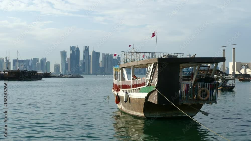 Close up from a traditional Dhow, Arab sailing vessel in the Dhow Harbour in Doha Qatar Close up from a traditional Dhow, Arab sailing vessel in the Dhow Harbour in Doha Qatar