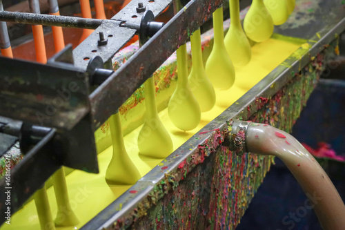 Balloon processing, blocks move to coat the rubber