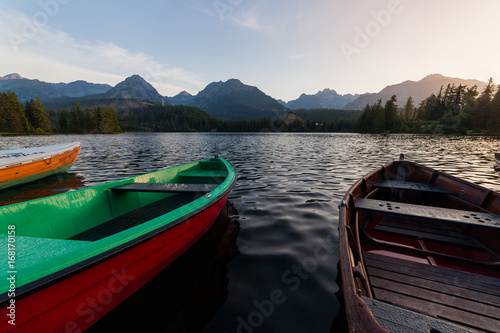 Wooden boats at the mountain lake
