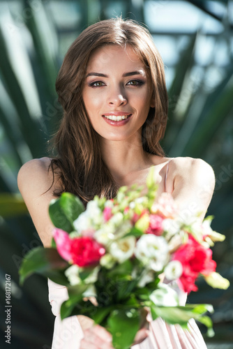 woman with flowers © LIGHTFIELD STUDIOS