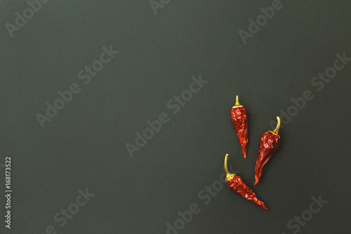 Three hot dried chili peppers
