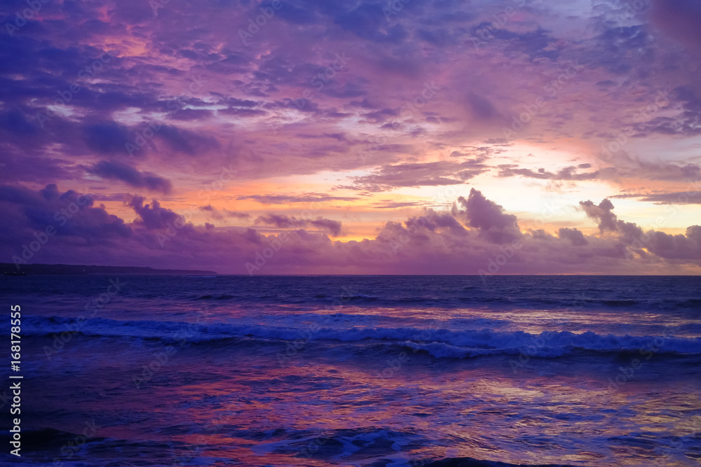 Spectacular purple balinese sunset on the sea. Bali, Indonesia.