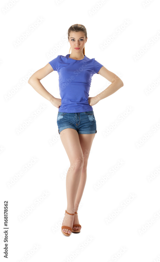 Girl in a T-shirt and shorts on a white background Girl in a T-shirt and shorts on a white background