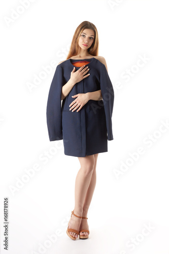 Woman trying on a coat