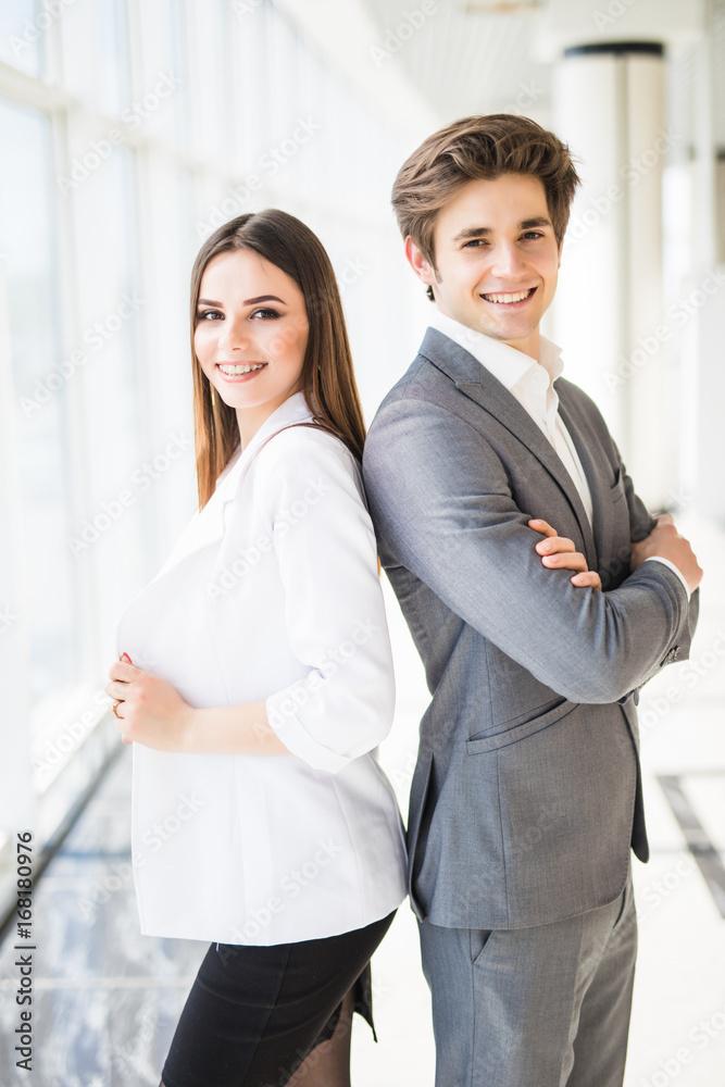 Confident business team of man and woman standing with crossed hands. couple of success business people ready to act. Confident business team of man and woman standing with crossed hands. couple of success business people ready to act.