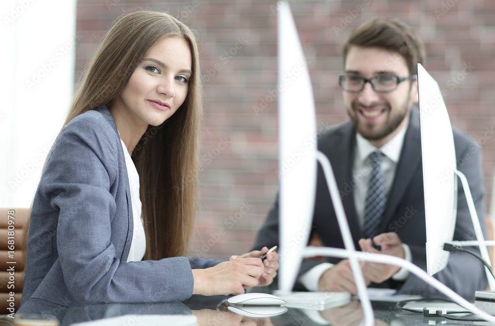 Fototapeta premium employees discuss work issues in the office