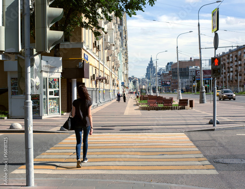 Crossing the street on forbidding signal of a traffic light © Ekaterina