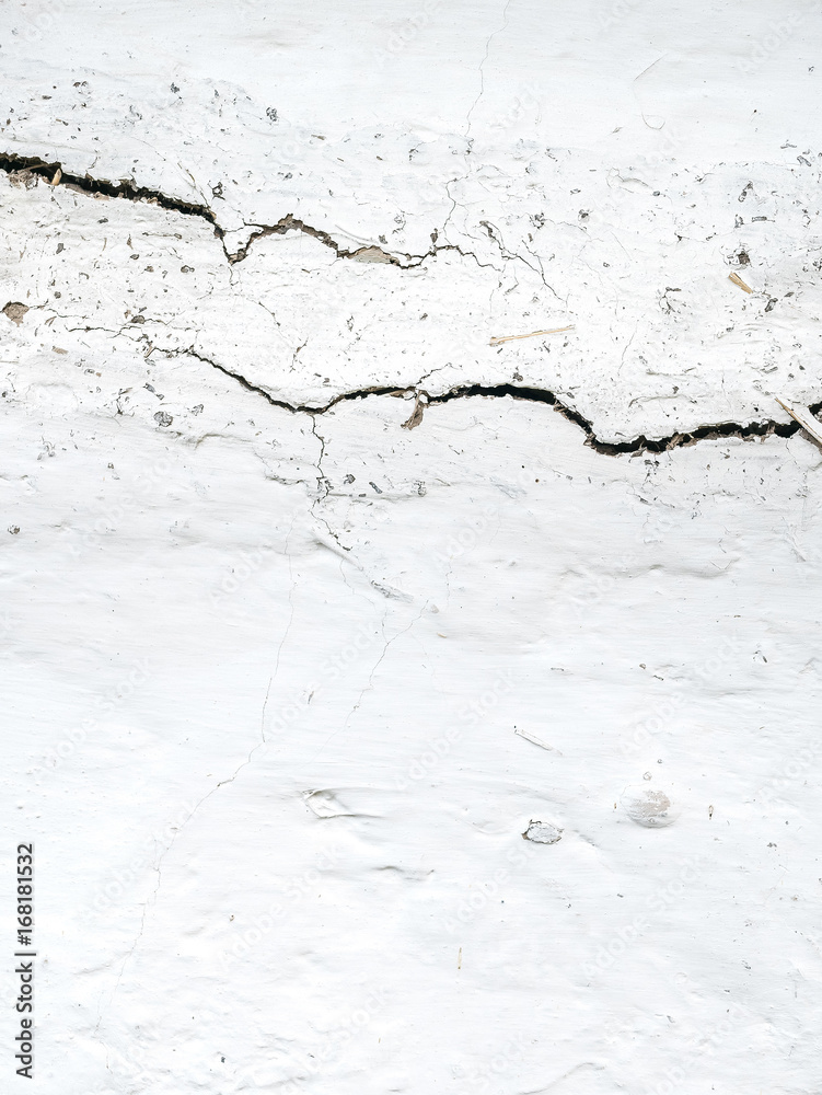White wall texture with cracks for background. White wall texture with cracks for background.
