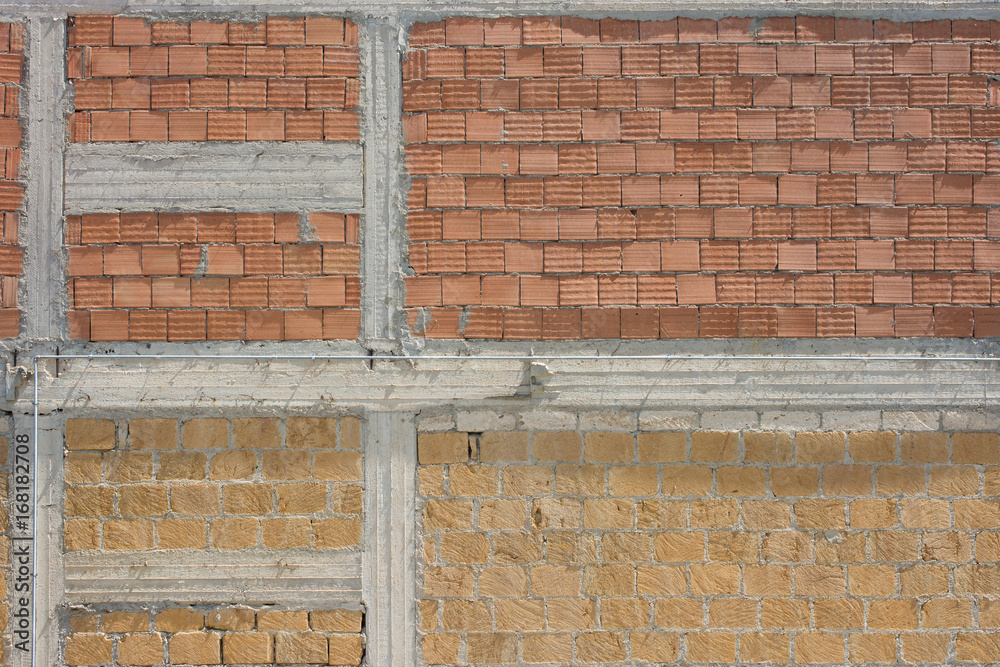 Pattern of chipped stones and brick wall texture and background