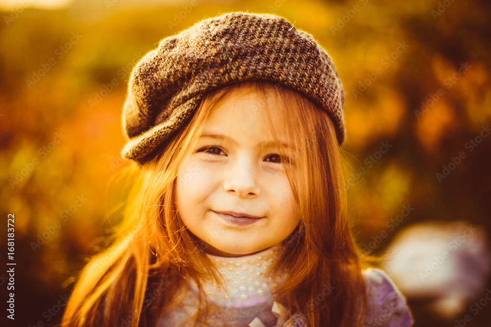 Charming little girl in a cap Charming little girl in a cap