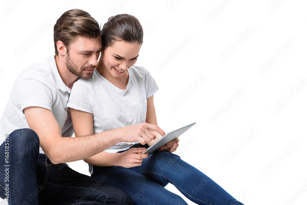 couple using digital tablet couple using digital tablet