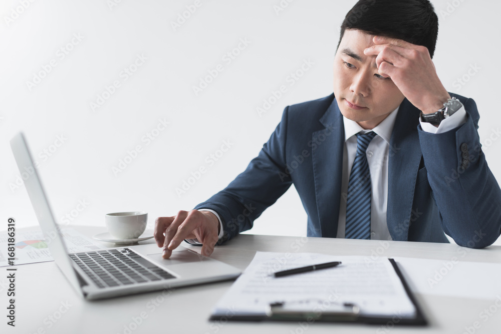 asian businessman with laptop at workplace asian businessman with laptop at workplace