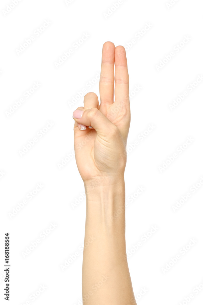 Woman's beautiful hand showing two fingers Woman's beautiful hand showing two fingers