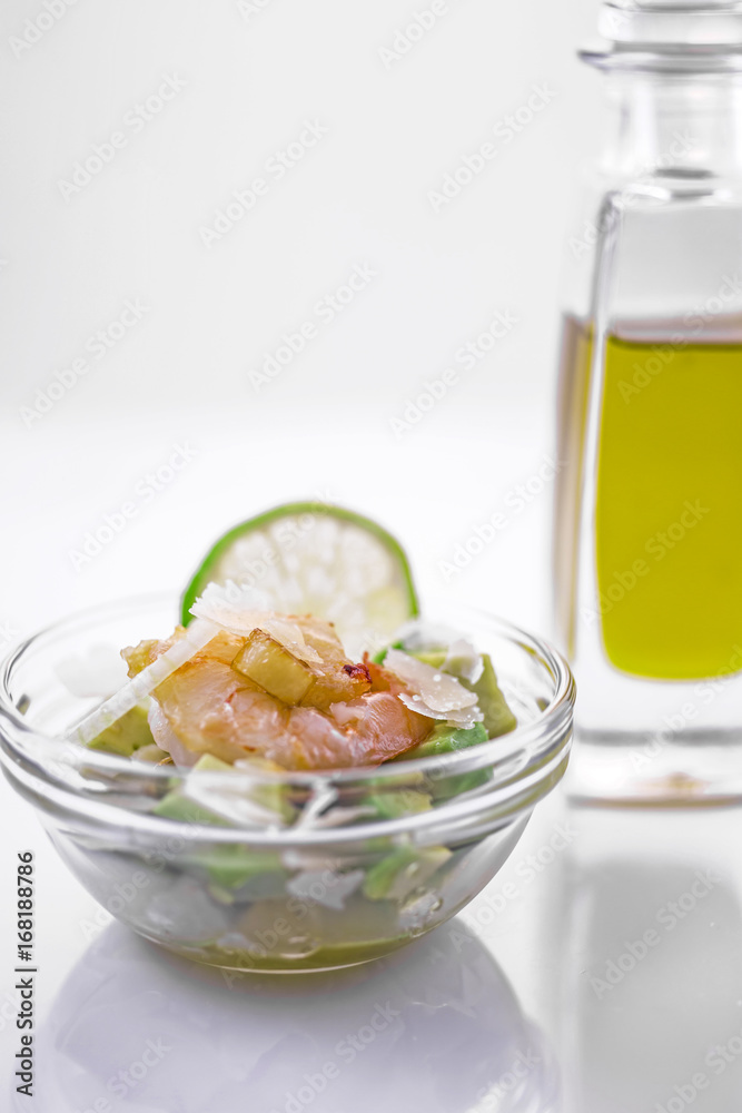 Salad of Avocado, fruit like butter, olive oil, onion, garlic, plate, prawn Salad of Avocado, fruit like butter, olive oil, onion, garlic, plate, prawn