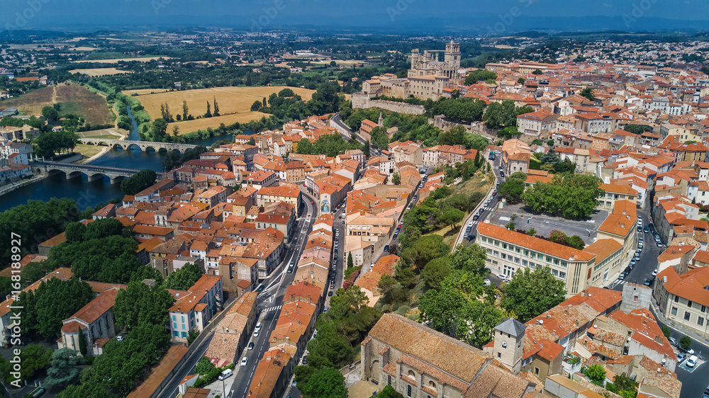 Aerial top view of Beziers town architecture and cathedral from above, South France
