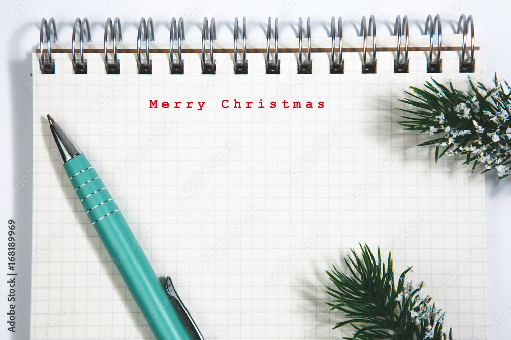 merry Christmas concept, Notebook and green pen merry Christmas concept, Notebook and green pen