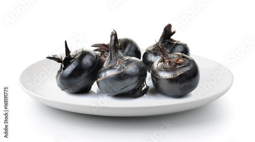 Waterchestnuts  plate isolated on a white background photo