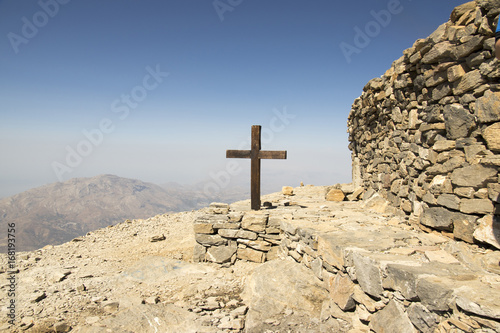Wooden cross, Mount Ida, windy mount, Idha, Idhi, Ita, Psiloritis is the highest mountain on Crete in Idi mountains photo