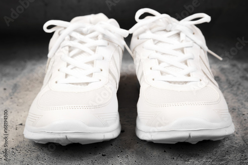 Pair of white sports shoes