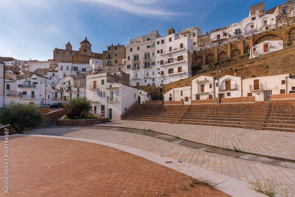 Fototapeta premium Pisticci (Matera, Italy) - A white town on the badlands hills, in province of Matera, Basilicata region, southern Italy