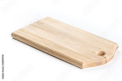 Brand new wooden cutting board isolated over white background
