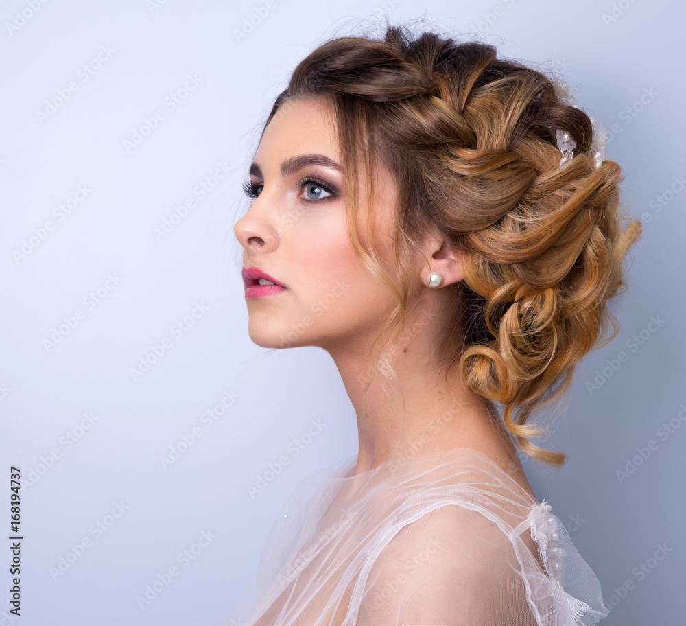 Fototapeta premium beautiful woman bride with tiara on head on bright background , copy space.