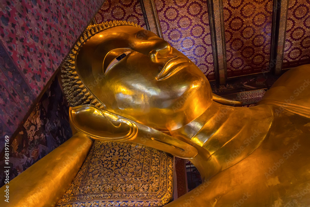 Golden lying buddha in Wat Pho in Thailand