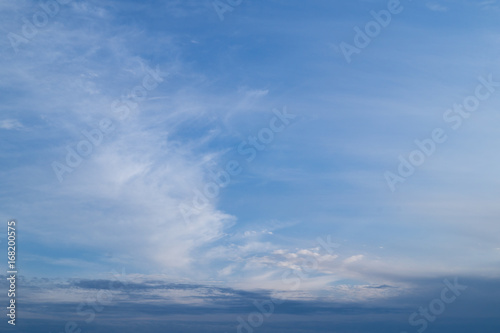 White striped clouds on the blue sky © Anastasia Gapeeva